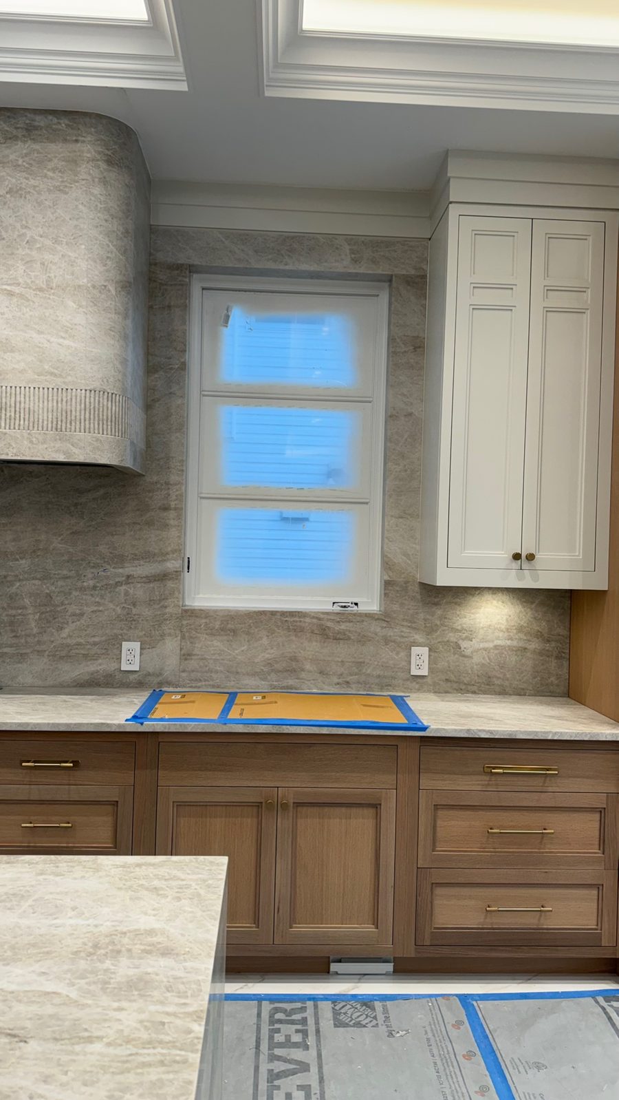 Taj Mahal quartzite backsplash by Fine Stone Works
